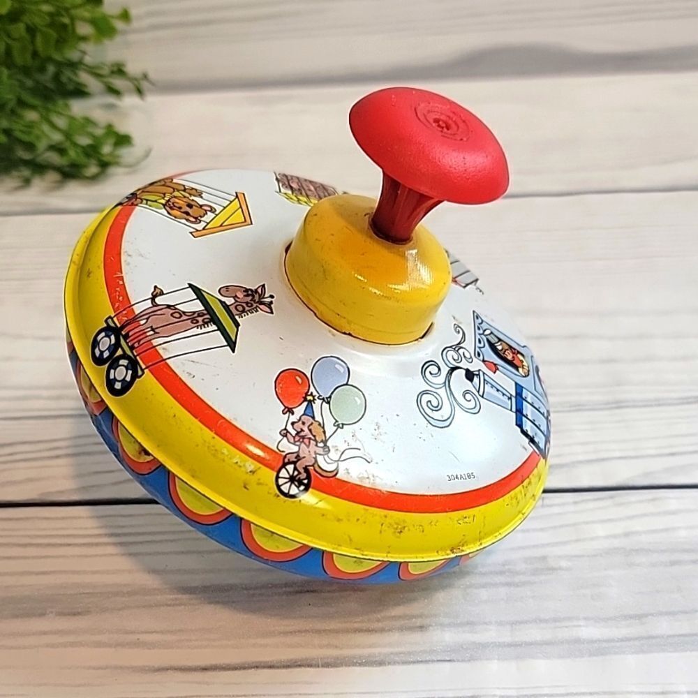 Vintage Ohio Art circus graphic spinning top toy